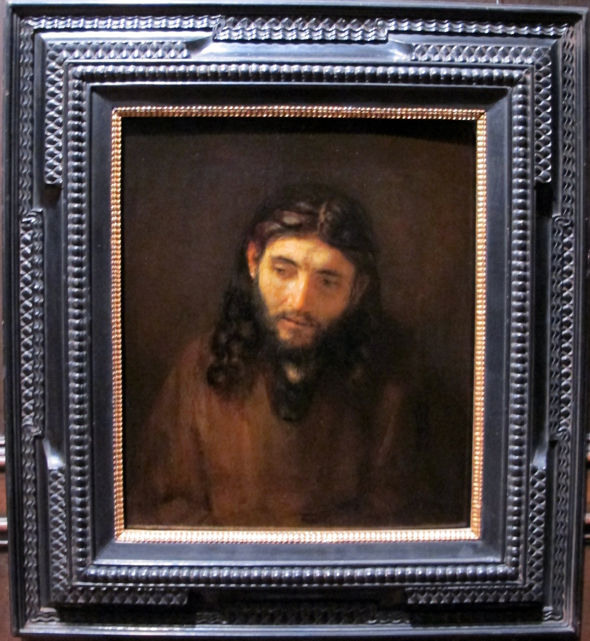 Tête du Christ de Rembrandt, visage méditatif éclairé de côté