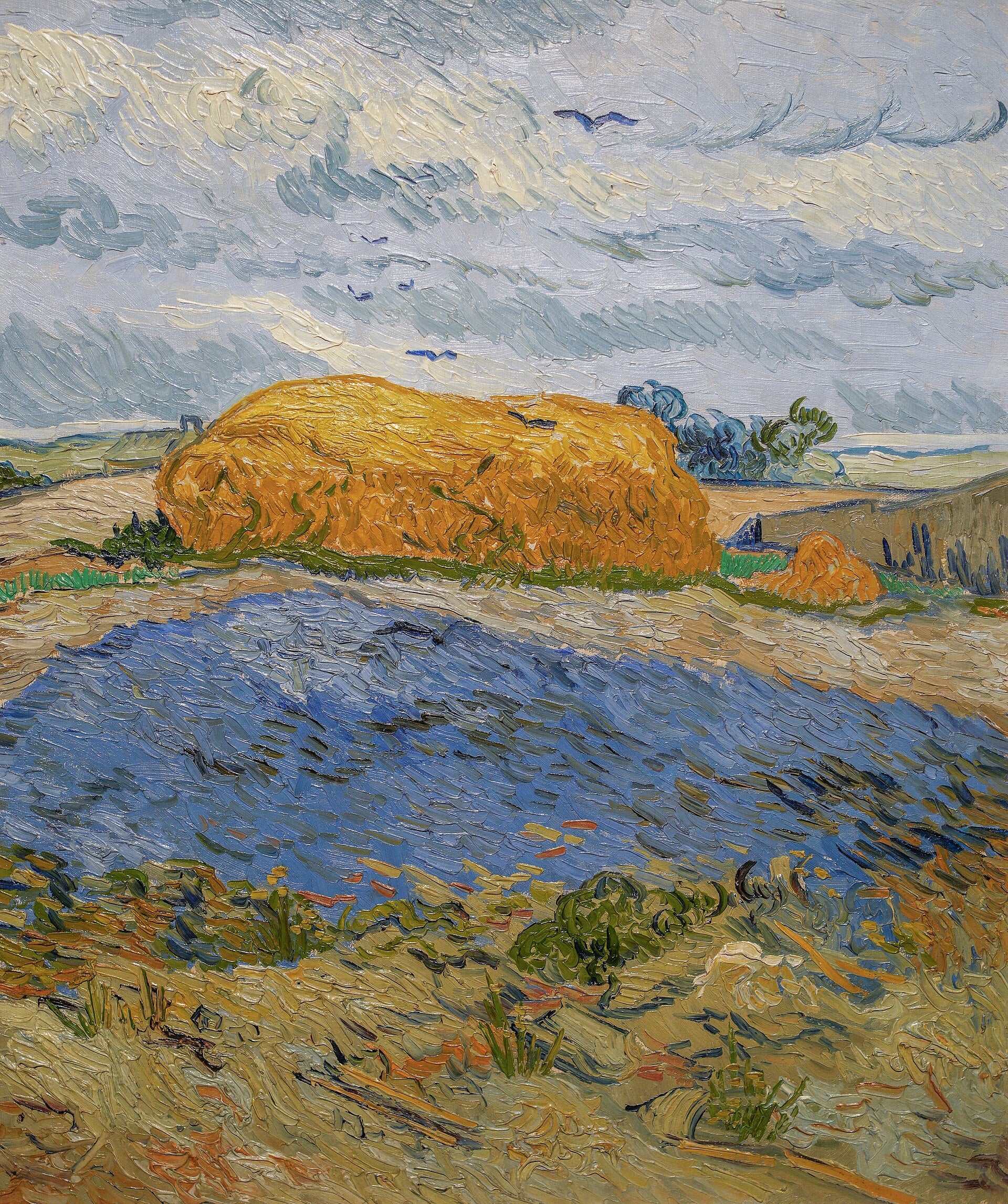 Meules de foin sous un ciel pluvieux - Vincent van Gogh