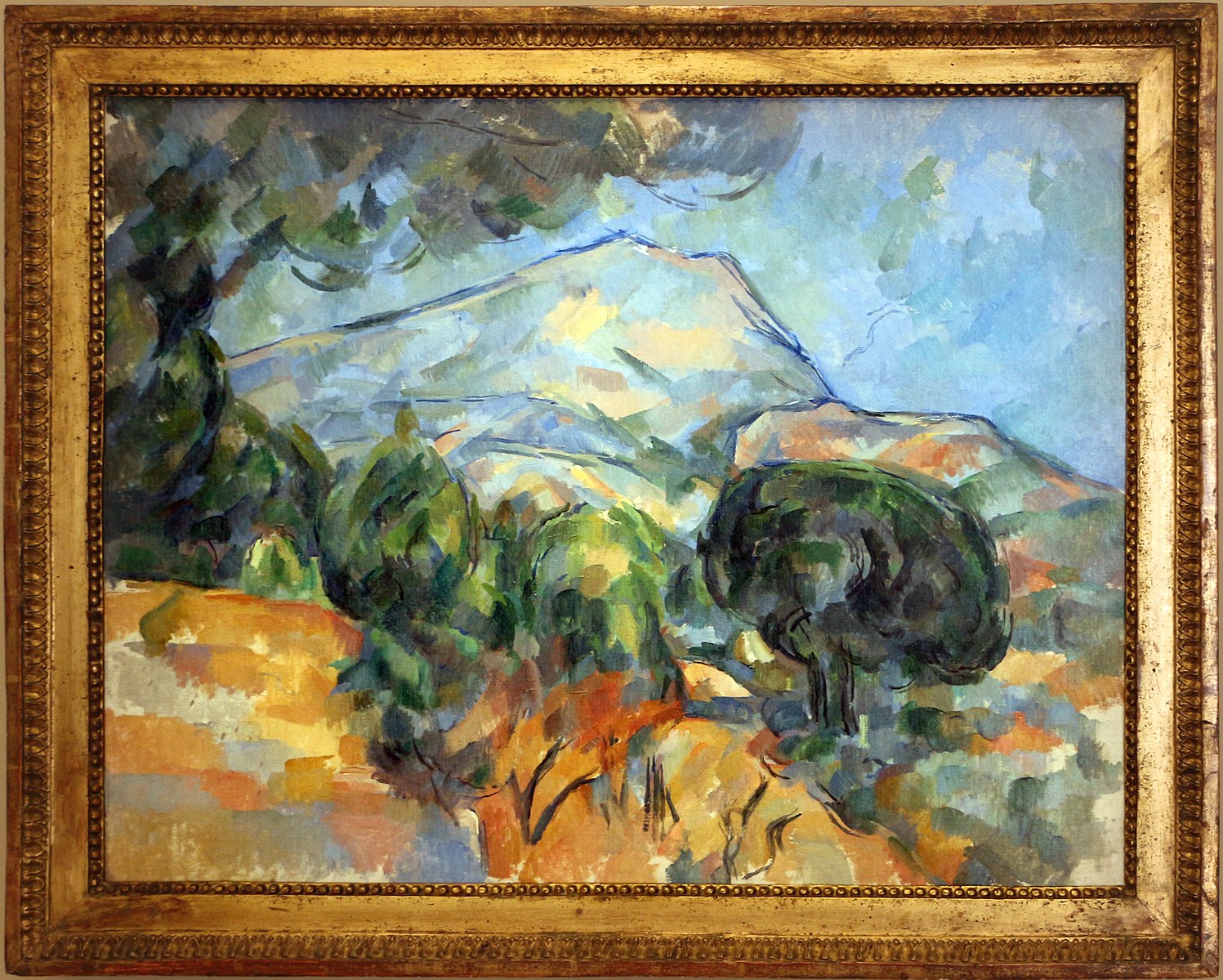 La Montagne Sainte-Victoire au-dessus de la route du Tholonet (avec pin parasol) - Paul Cézanne