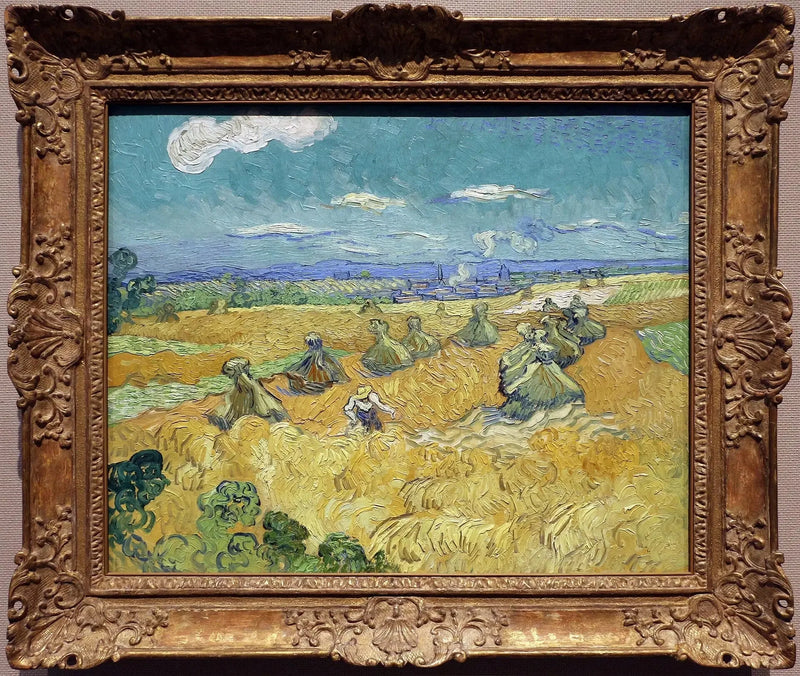 Champ de blé avec gerbes et moissonneuse - Vincent van Gogh