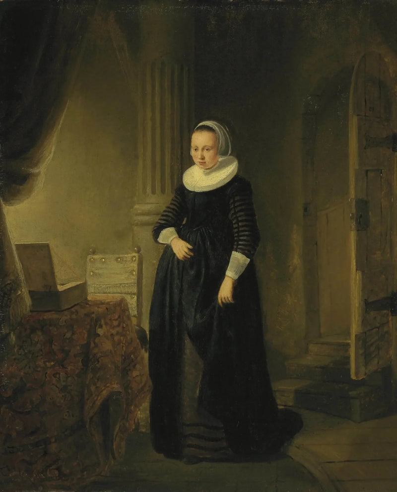 Portrait d'une femme, debout en pied dans un intérieur - Rembrandt