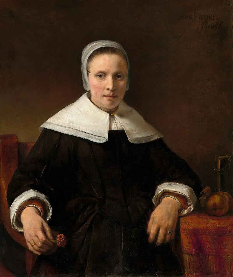 Une femme tenant une rose - Rembrandt