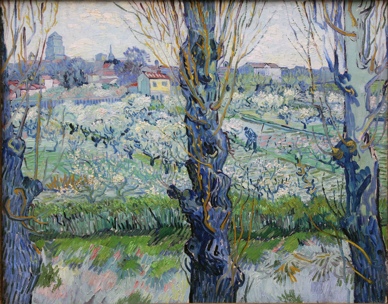 Verger en fleur avec vue d’Arles, F516 – Van Gogh